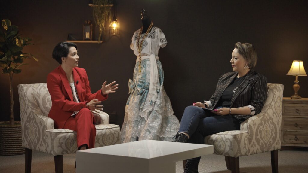 Image of two women speaking during a podcast recording, filmed by Media Knowledge Group for their latest episode on empowering women in business.