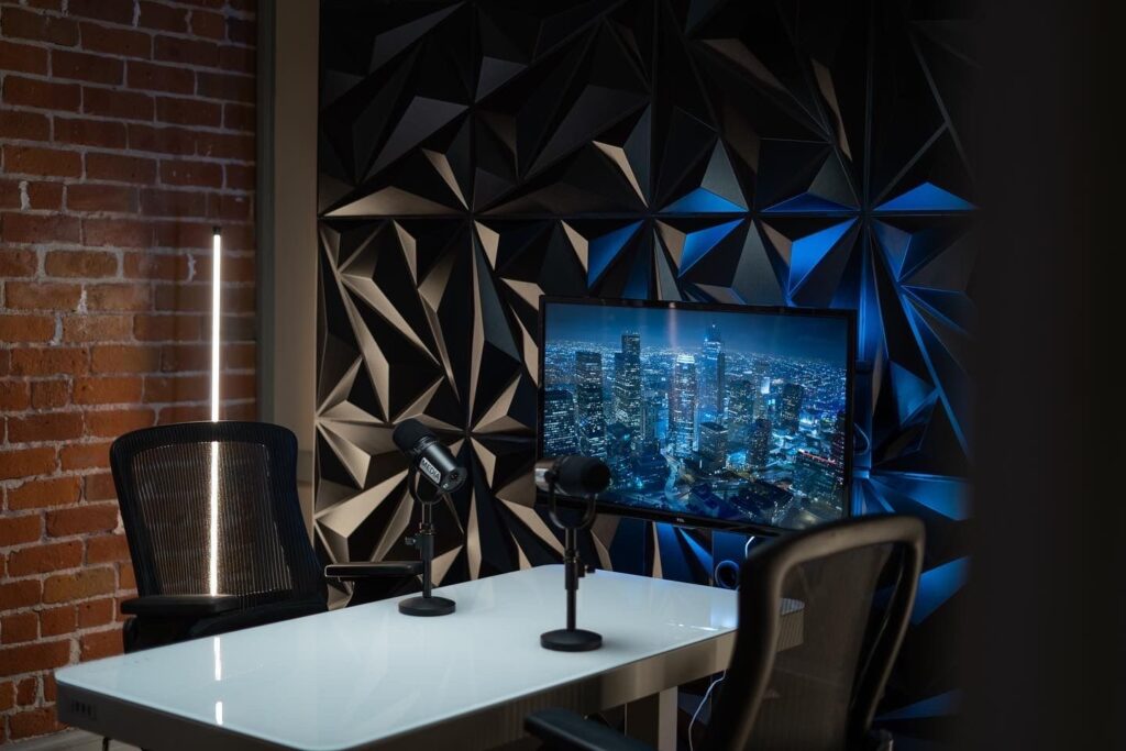 A view of a modern podcast studio with professional equipment and a soundproof environment