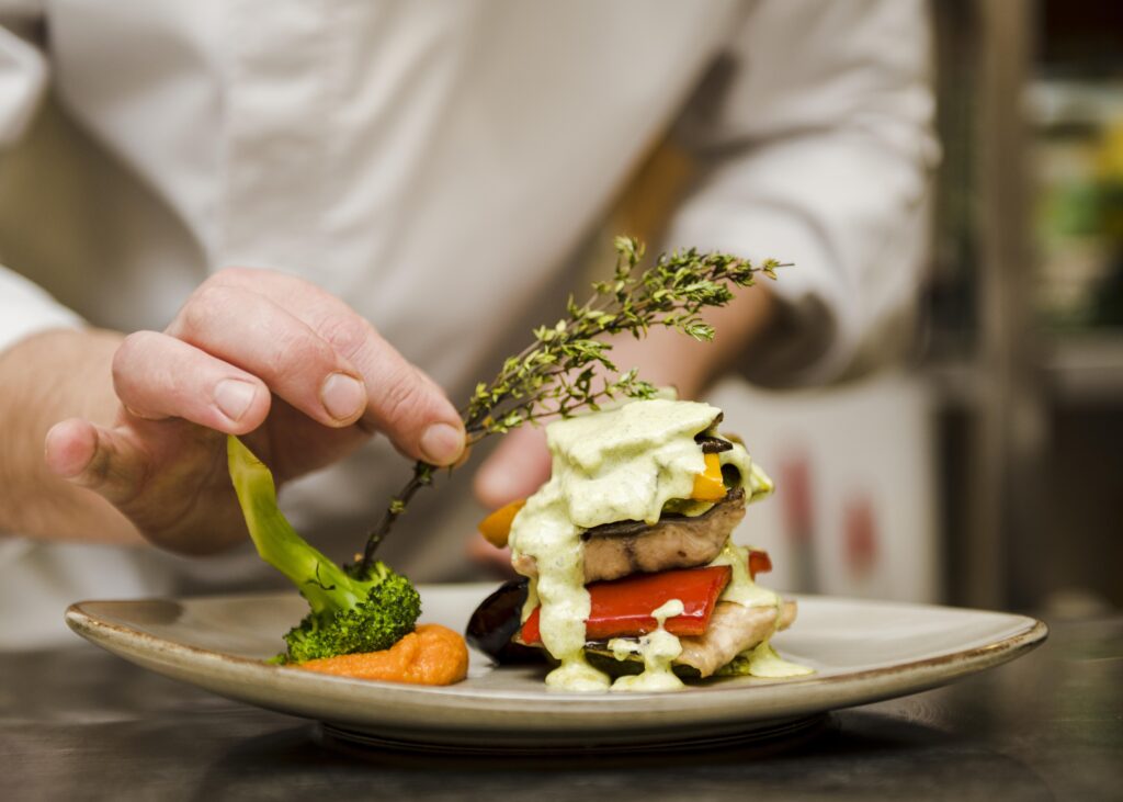 Sizzling grilled steak with a side of roasted vegetables and creamy mashed potatoes